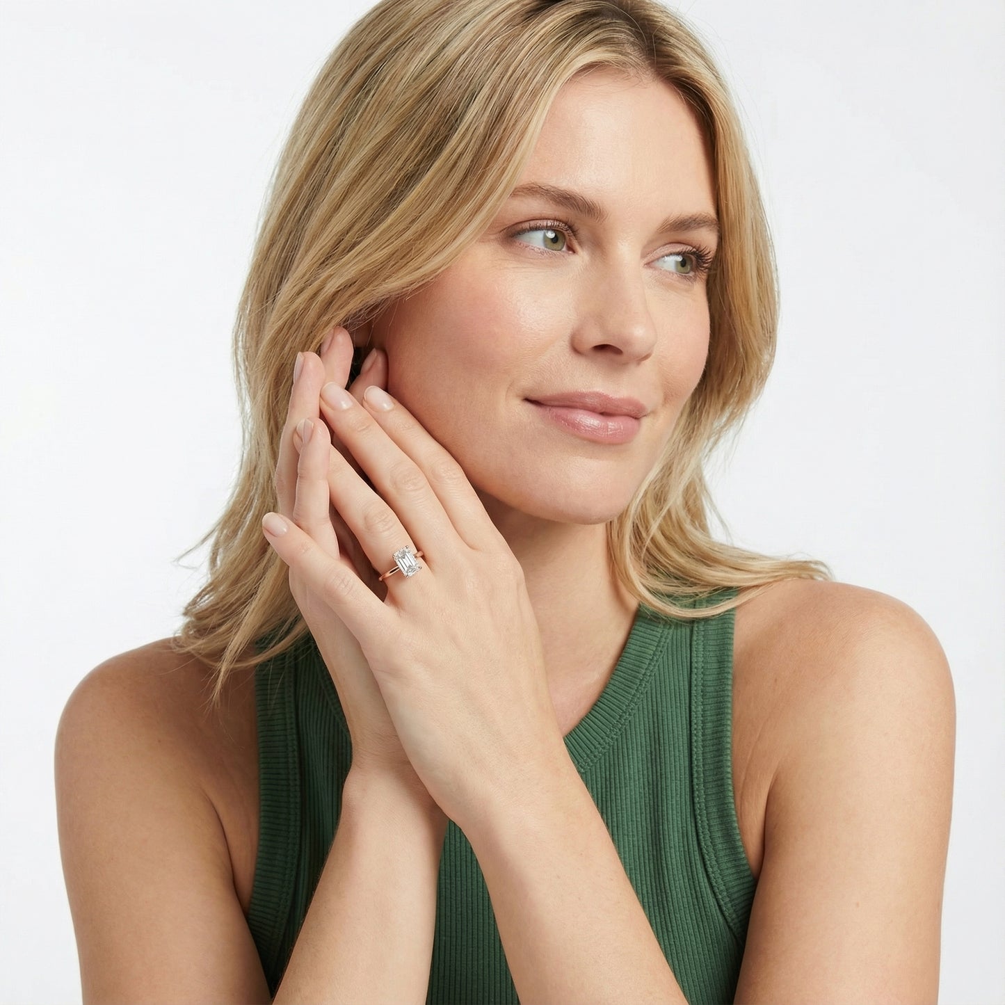 Emerald Cut Lab Grown Diamond Solitaire Engagement Ring in Rose Gold showing side profile and bridge