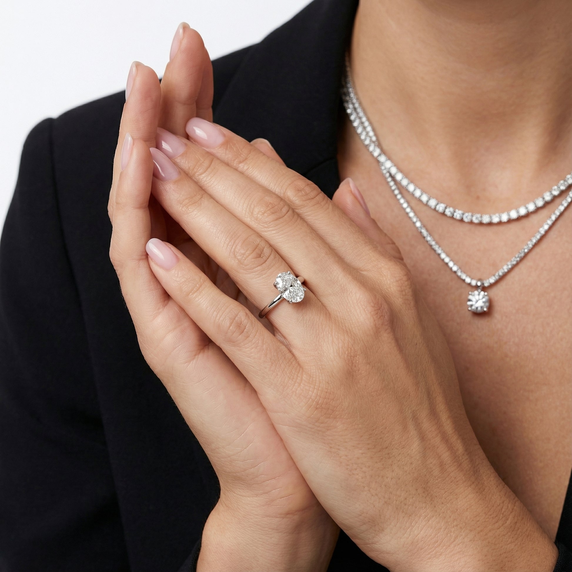 Oval Cut Lab Grown Diamond Engagement Ring in Silver with floral prong setting