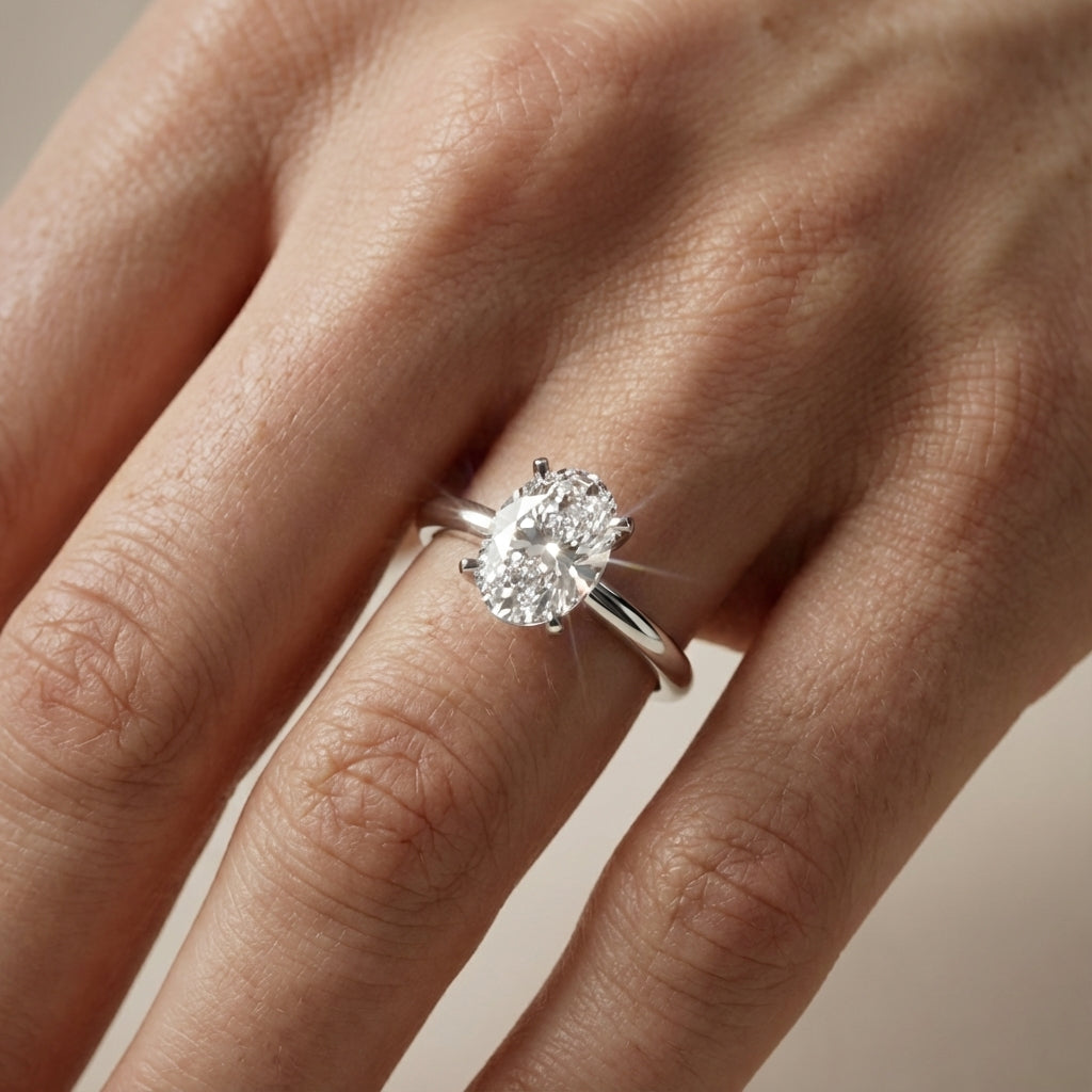 Oval Cut Lab Grown Diamond Engagement Ring in Platinum showing sleek band