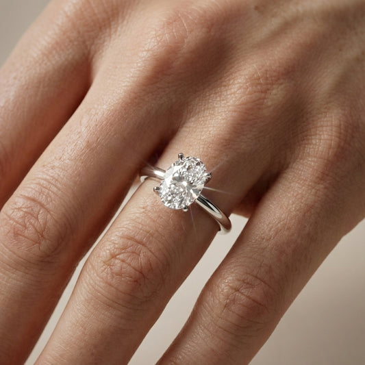 Oval Cut Lab Grown Diamond Engagement Ring in White Gold with cathedral setting