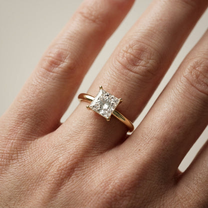 Princess Cut Lab Grown Diamond Solitaire Engagement Ring in Yellow Gold showing cathedral setting