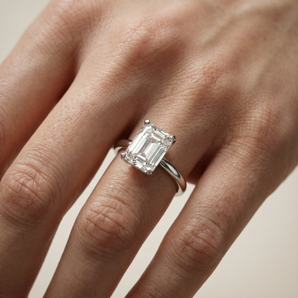 Emerald Cut Lab Grown Diamond Solitaire Engagement Ring in Silver with floral under-gallery details
