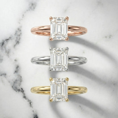 Emerald Cut Lab Grown Diamond Solitaire Engagement Ring in Rose Gold showing side profile and bridge