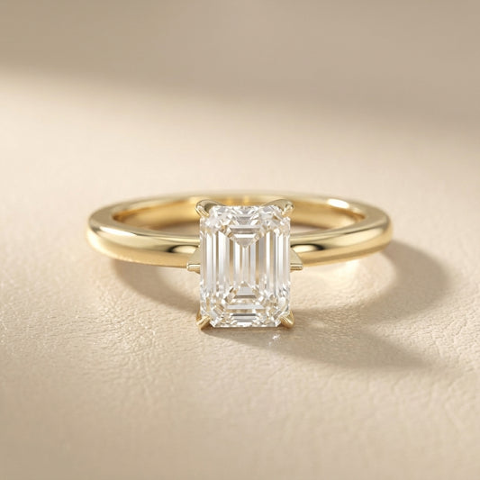 Emerald Cut Lab Grown Diamond Solitaire Engagement Ring with Floral Setting in Yellow Gold