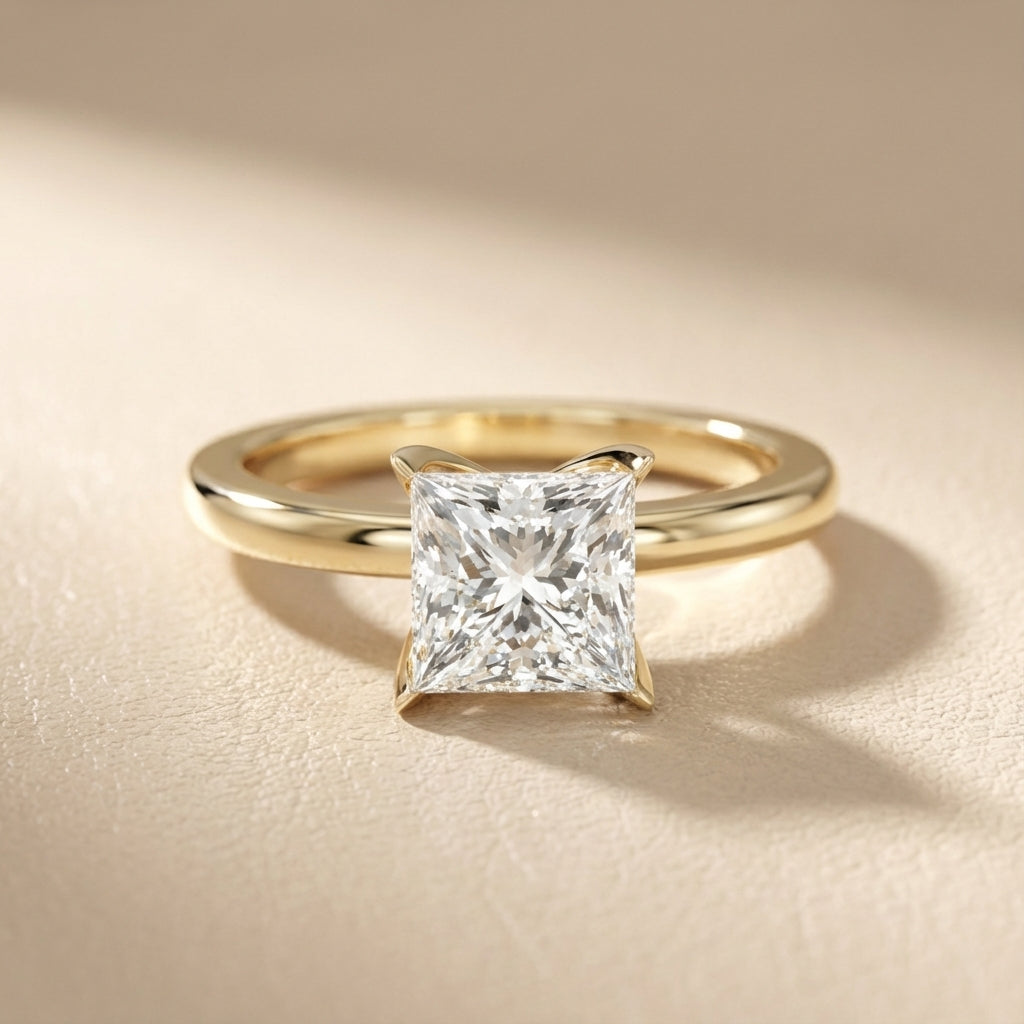 Princess Cut Lab Grown Diamond Solitaire Engagement Ring in Yellow Gold showing floral basket detail.