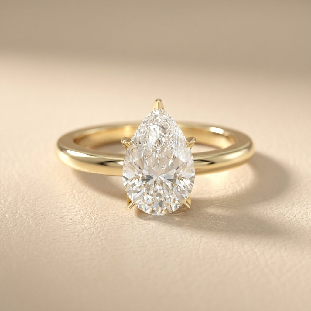 Pear Cut Lab Grown Diamond Engagement Ring in Yellow Gold with six prongs
