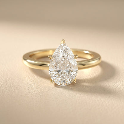 Pear Cut Lab Grown Diamond Engagement Ring in Yellow Gold with six prongs
