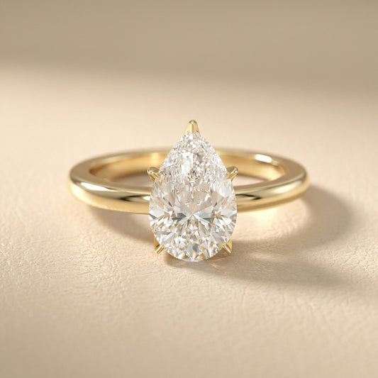 Pear Cut Lab Grown Diamond Engagement Ring in Yellow Gold with six prongs