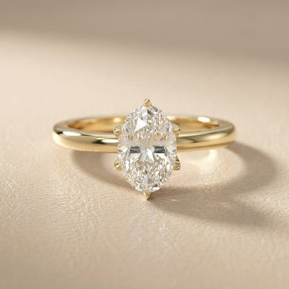Oval Cut Lab Grown Diamond Solitaire Engagement Ring in Yellow Gold with six prong setting.
