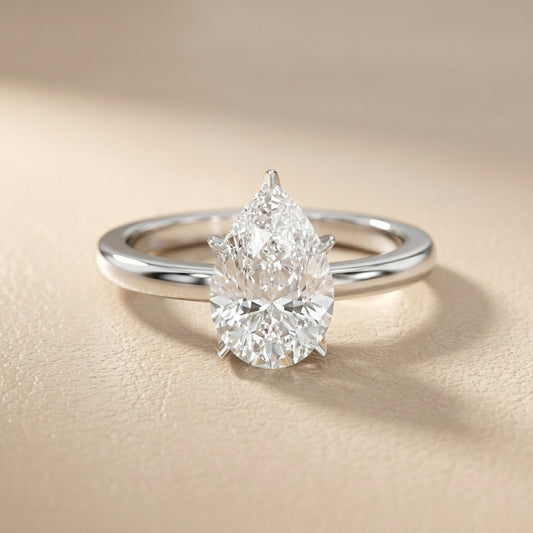 Pear Cut Lab Grown Diamond Engagement Ring in Platinum floral setting