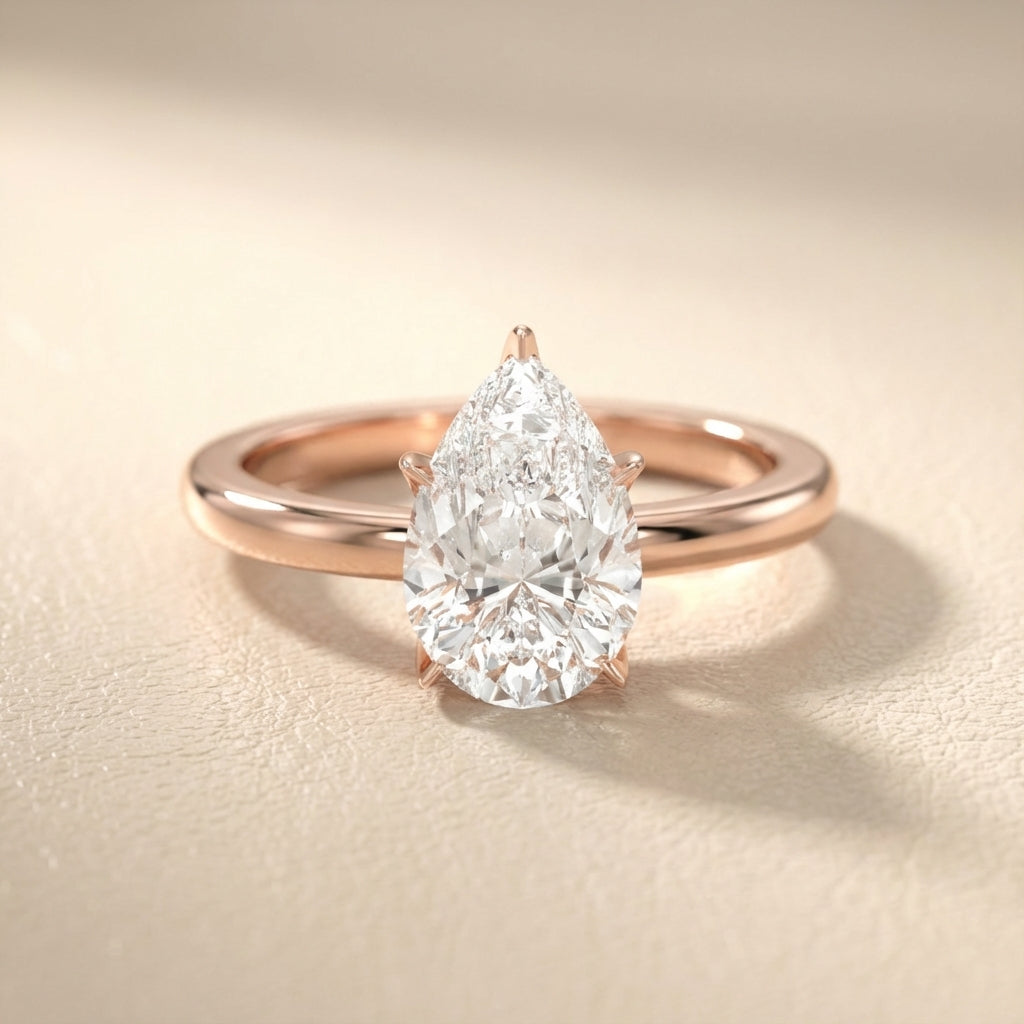 Pear Cut Lab Grown Diamond Engagement Ring in Rose Gold showing side profile