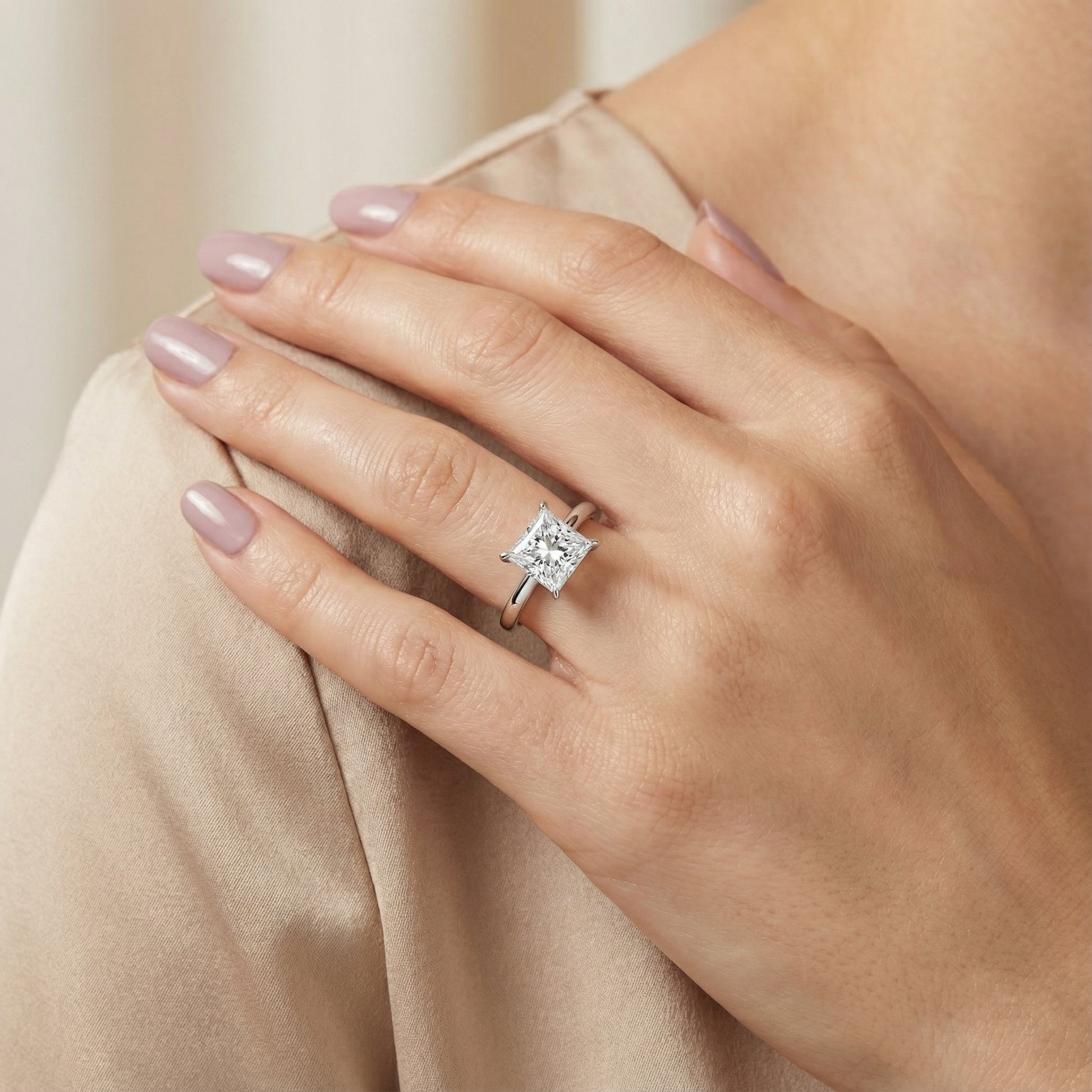 Princess Cut Lab Grown Diamond Solitaire Engagement Ring in Platinum with sleek band.
