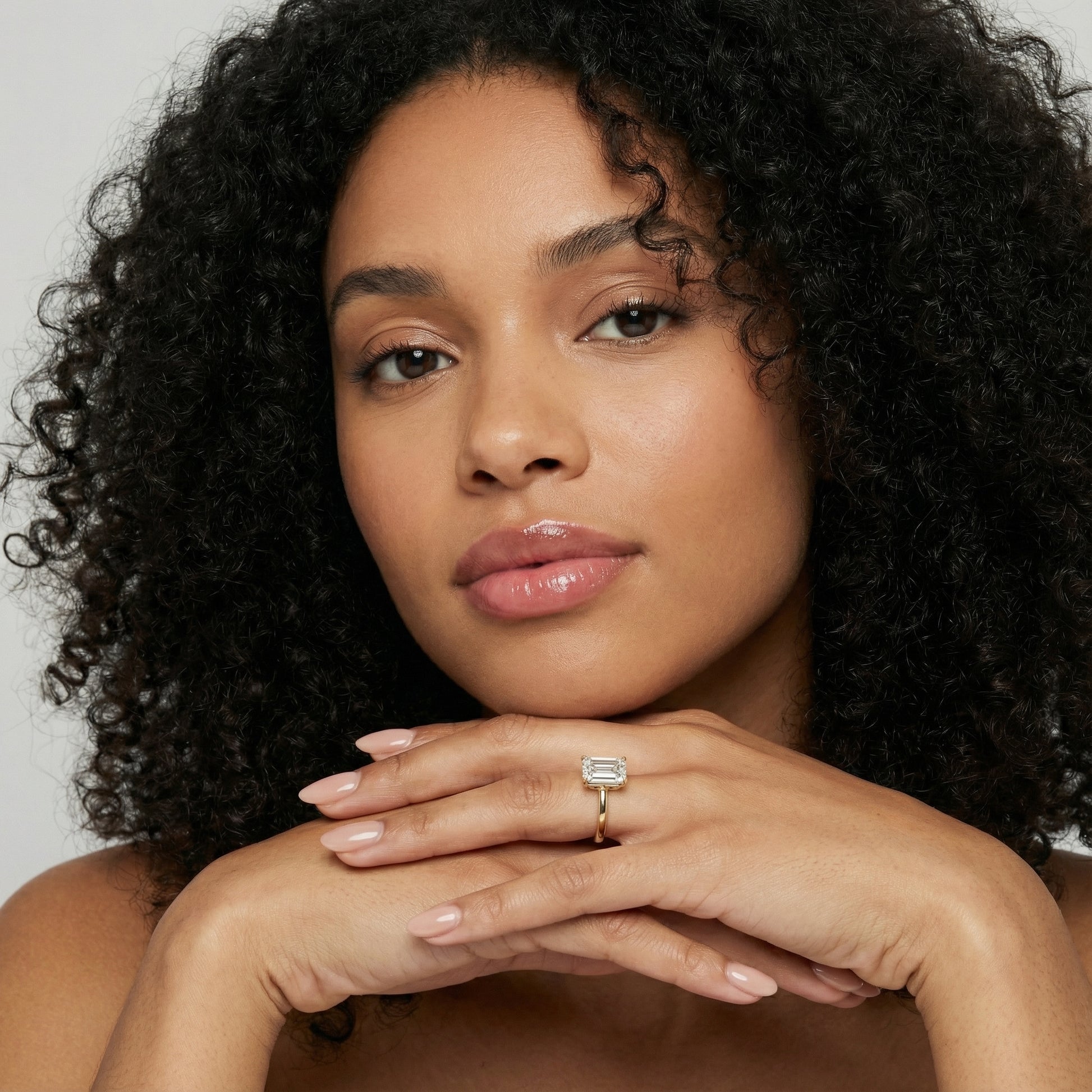 Emerald Cut Lab Grown Diamond Solitaire Engagement Ring with Floral Setting in Yellow Gold