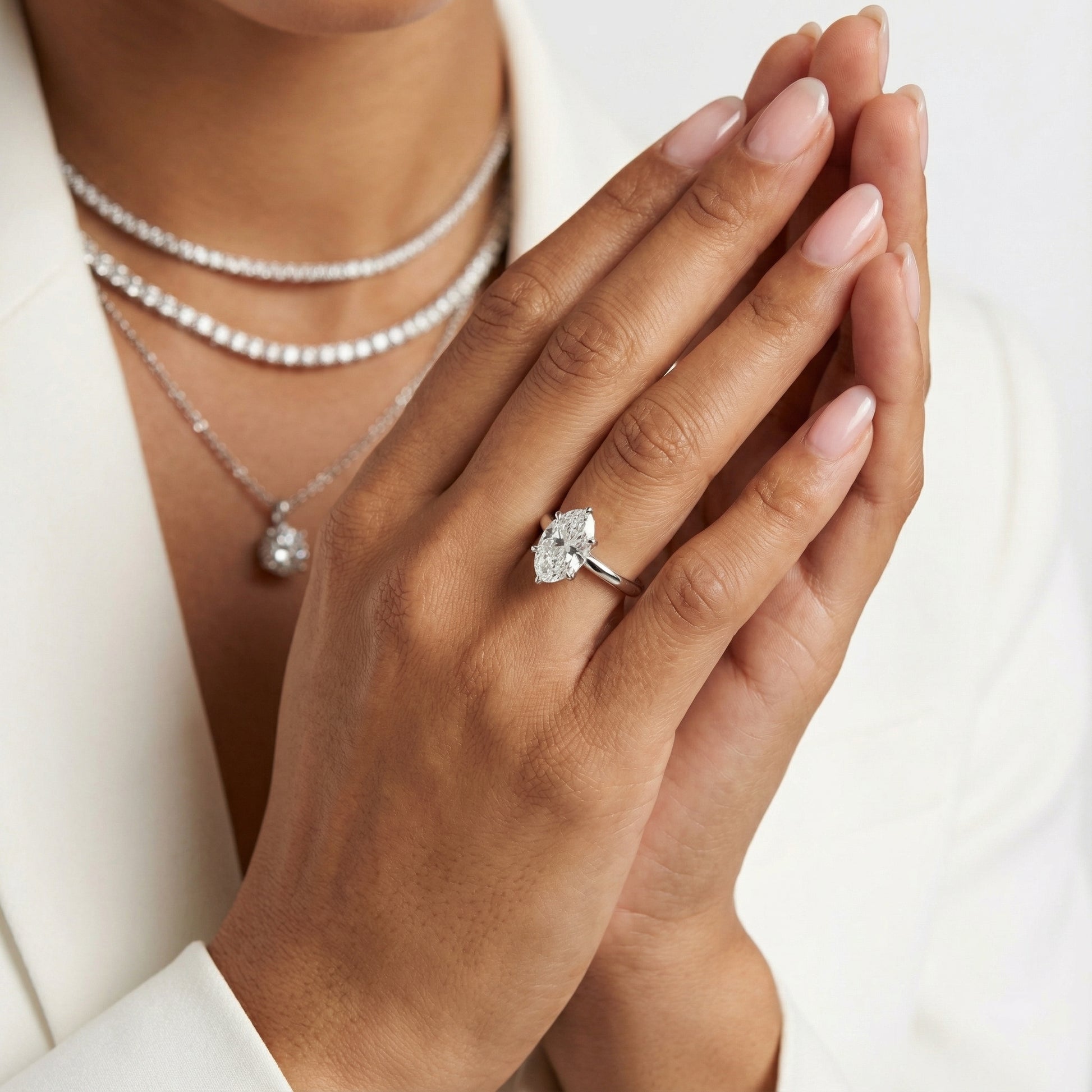 Oval Cut Lab Grown Diamond Solitaire Engagement Ring in White Gold side profile view.