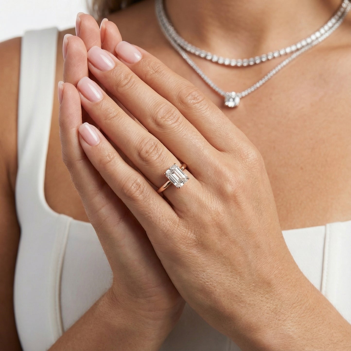 Emerald Cut Lab Grown Diamond Solitaire Engagement Ring with Floral Setting in Rose Gold