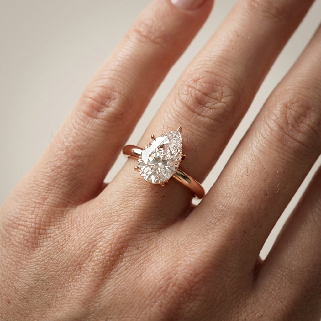 Pear Cut Lab Grown Diamond Engagement Ring in Rose Gold showing side profile