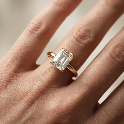 Emerald Cut Lab Grown Diamond Solitaire Engagement Ring with Floral Setting in Yellow Gold