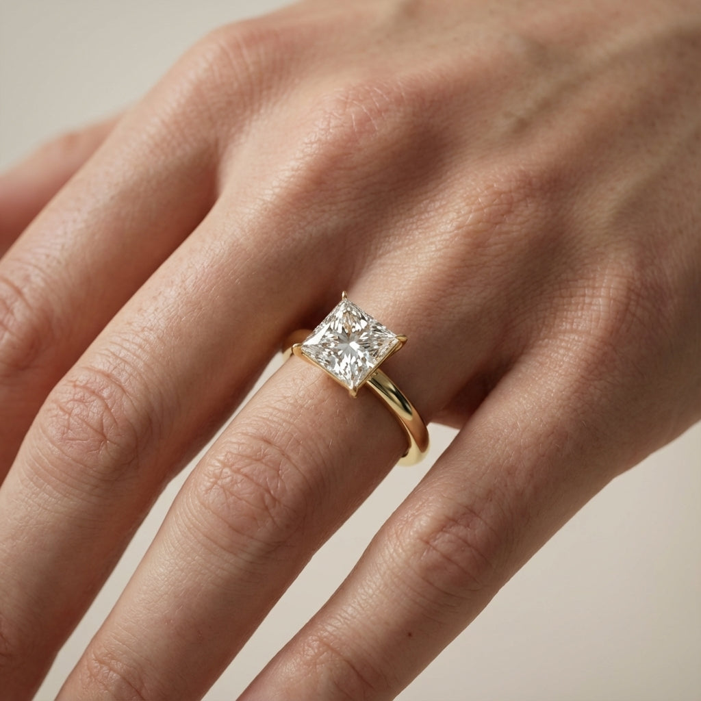 Princess Cut Lab Grown Diamond Solitaire Engagement Ring in Yellow Gold showing floral basket detail.