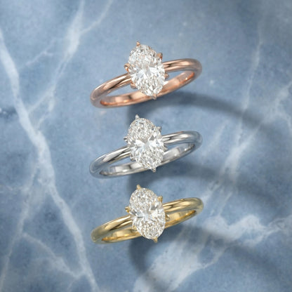 Oval Cut Lab Grown Diamond Solitaire Engagement Ring in Yellow Gold with six prong setting.