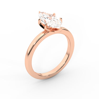 Marquise cut lab grown diamond solitaire engagement ring in rose gold showing cathedral setting and floral prongs.