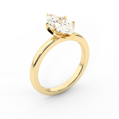 Yellow gold marquise cut lab grown diamond solitaire engagement ring with polished band and floral prongs.