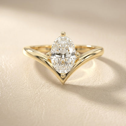 Oval Cut Lab Grown Diamond Chevron Solitaire Engagement Ring in Yellow Gold