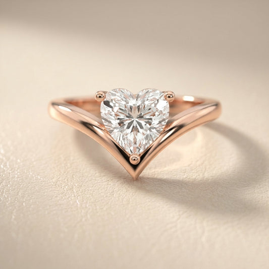 Evelyn Chevron Solitaire Ring featuring a Heart Cut Lab Grown Diamond in Rose Gold