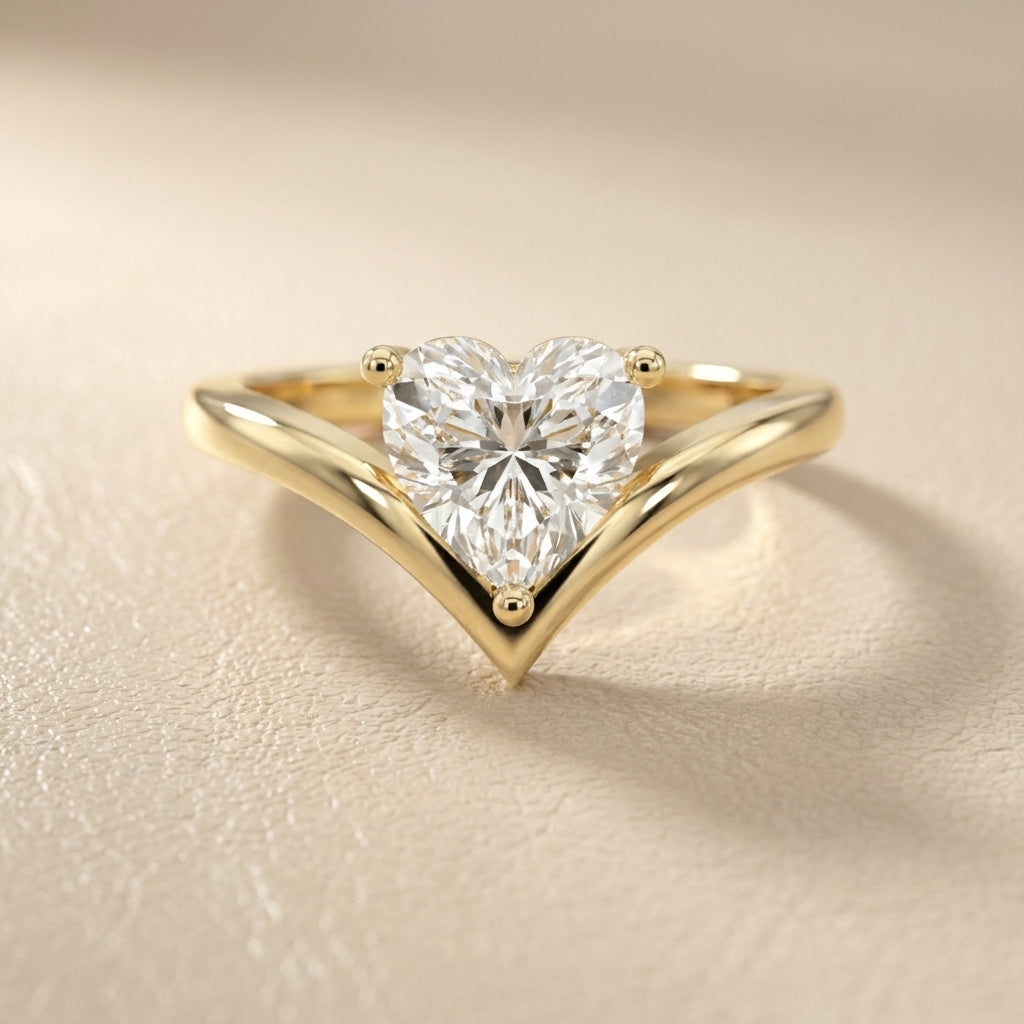 Evelyn Chevron Solitaire Ring featuring a Heart Cut Lab Grown Diamond in Yellow Gold