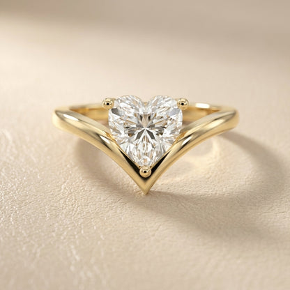 Evelyn Chevron Solitaire Ring featuring a Heart Cut Lab Grown Diamond in Yellow Gold