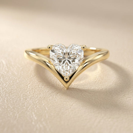 Evelyn Chevron Solitaire Ring featuring a Heart Cut Lab Grown Diamond in Yellow Gold