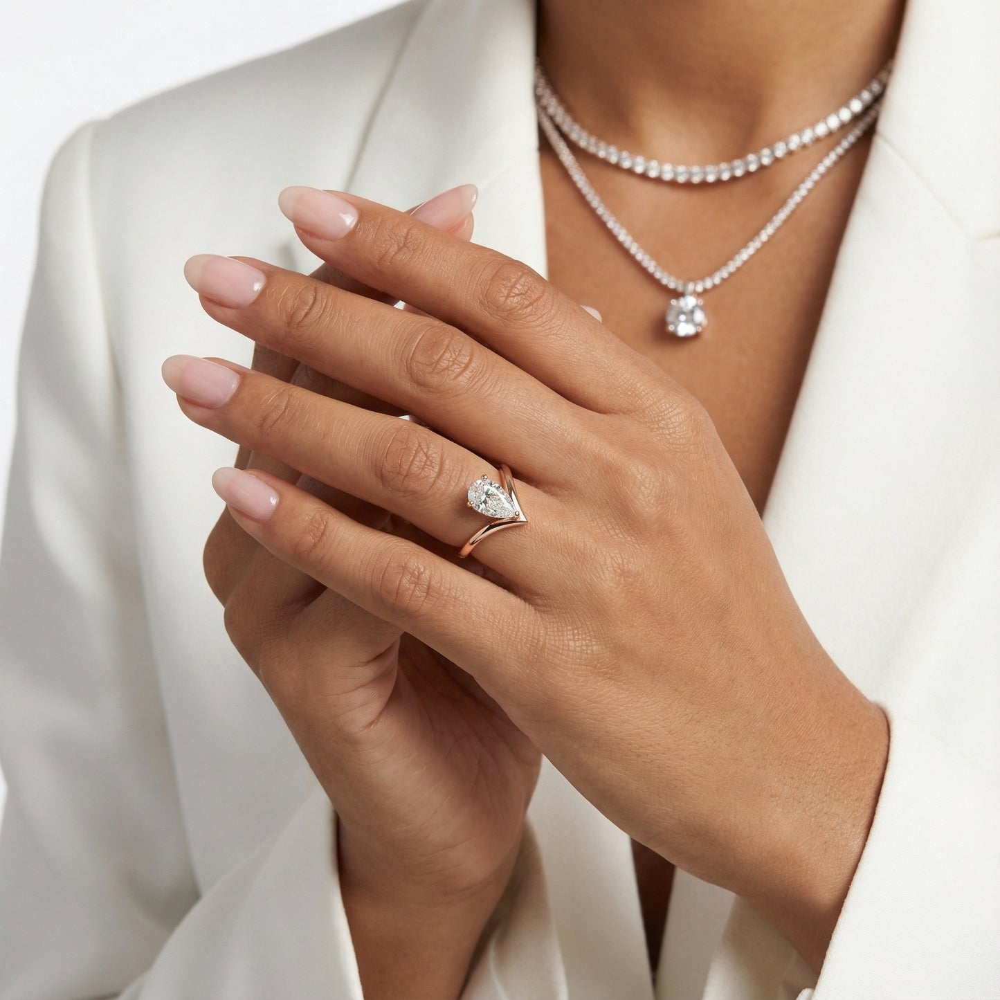 Pear Cut Lab Grown Diamond Chevron Solitaire Engagement Ring in Rose Gold