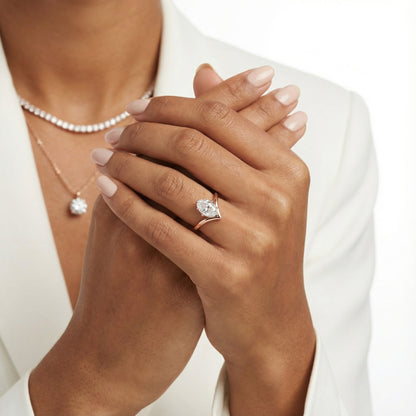 Oval Cut Lab Grown Diamond Chevron Solitaire Engagement Ring in Rose Gold setting