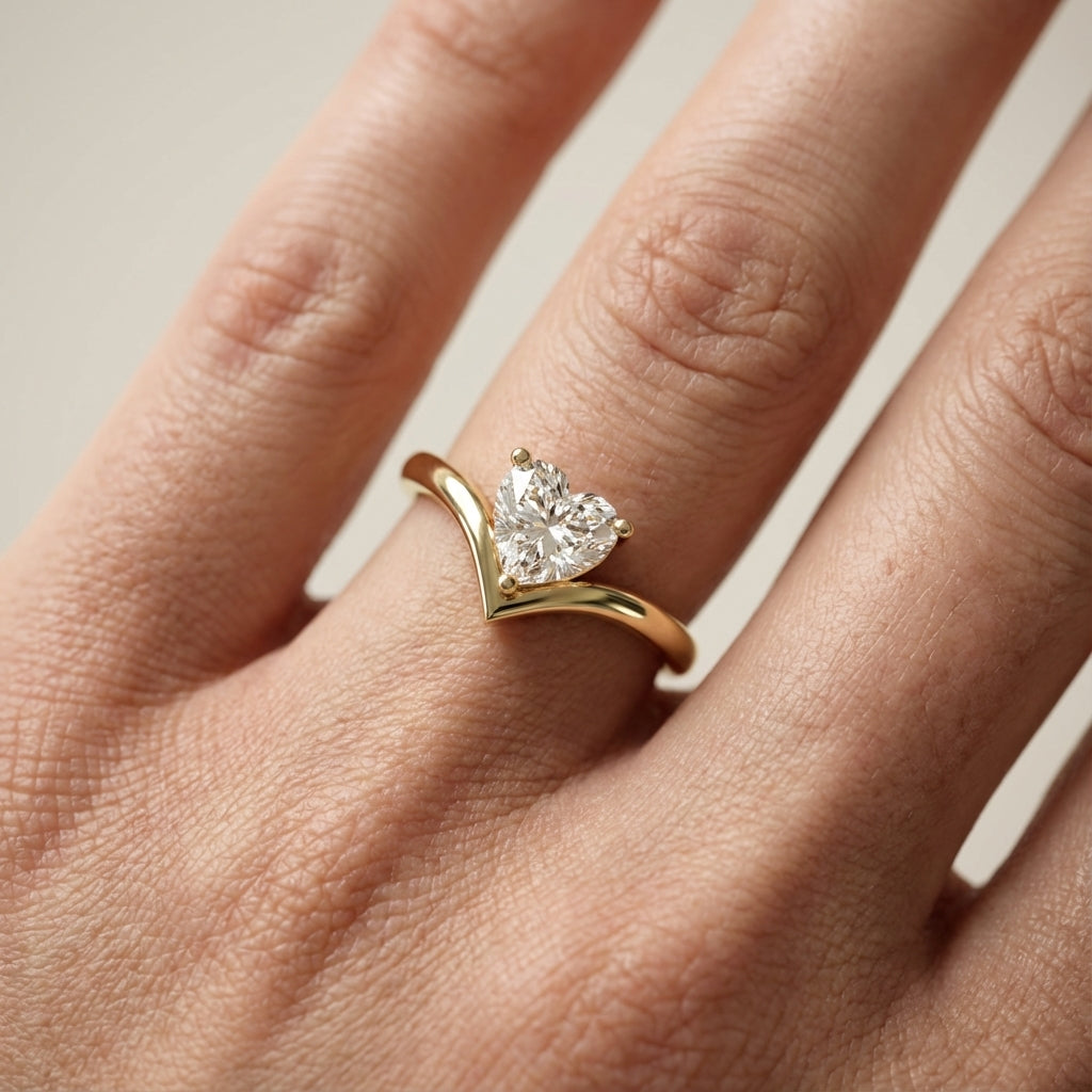 Evelyn Chevron Solitaire Ring featuring a Heart Cut Lab Grown Diamond in Yellow Gold