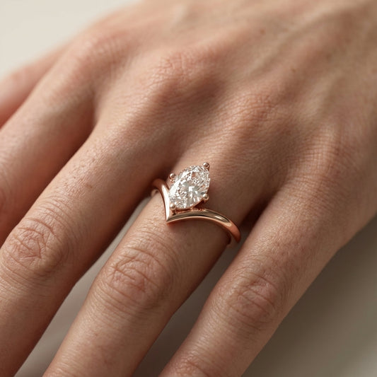 Oval Cut Lab Grown Diamond Chevron Solitaire Engagement Ring in Rose Gold setting