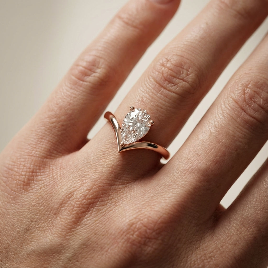 Pear Cut Lab Grown Diamond Chevron Solitaire Engagement Ring in Rose Gold