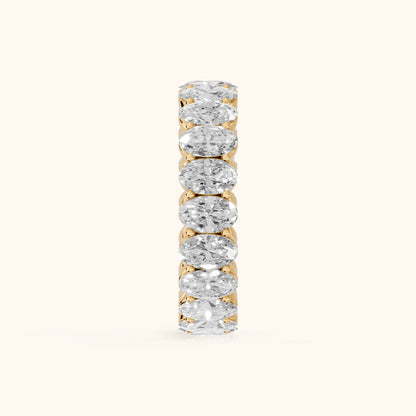 Vidya Shared Prong Oval Diamond Eternity Band in Yellow Gold - SideView