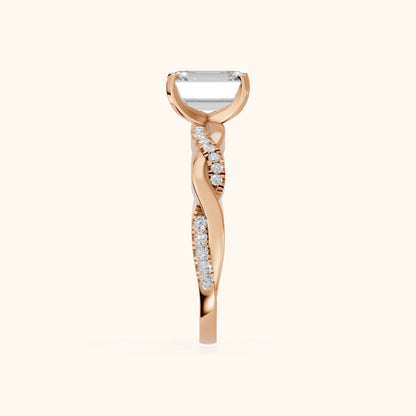 Twisted Side Stone Emerald Diamond Engagement Ring in Rose Gold - SideView