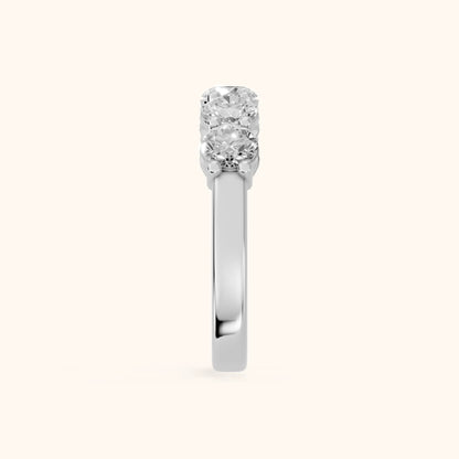 Theia Shared Prong Round Diamond Wedding Band in Platinum - SideView