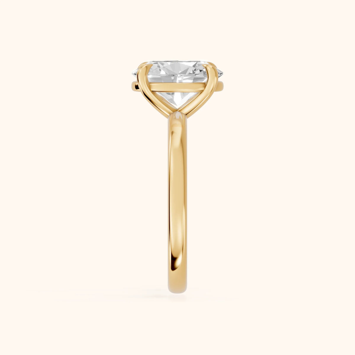 Rowan Basket Solitaire Oval Diamond Engagement Ring in Yellow Gold - SideView.webp