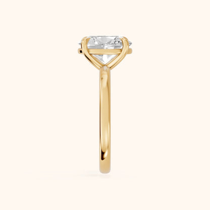 Rowan Basket Solitaire Oval Diamond Engagement Ring in Yellow Gold - SideView.webp