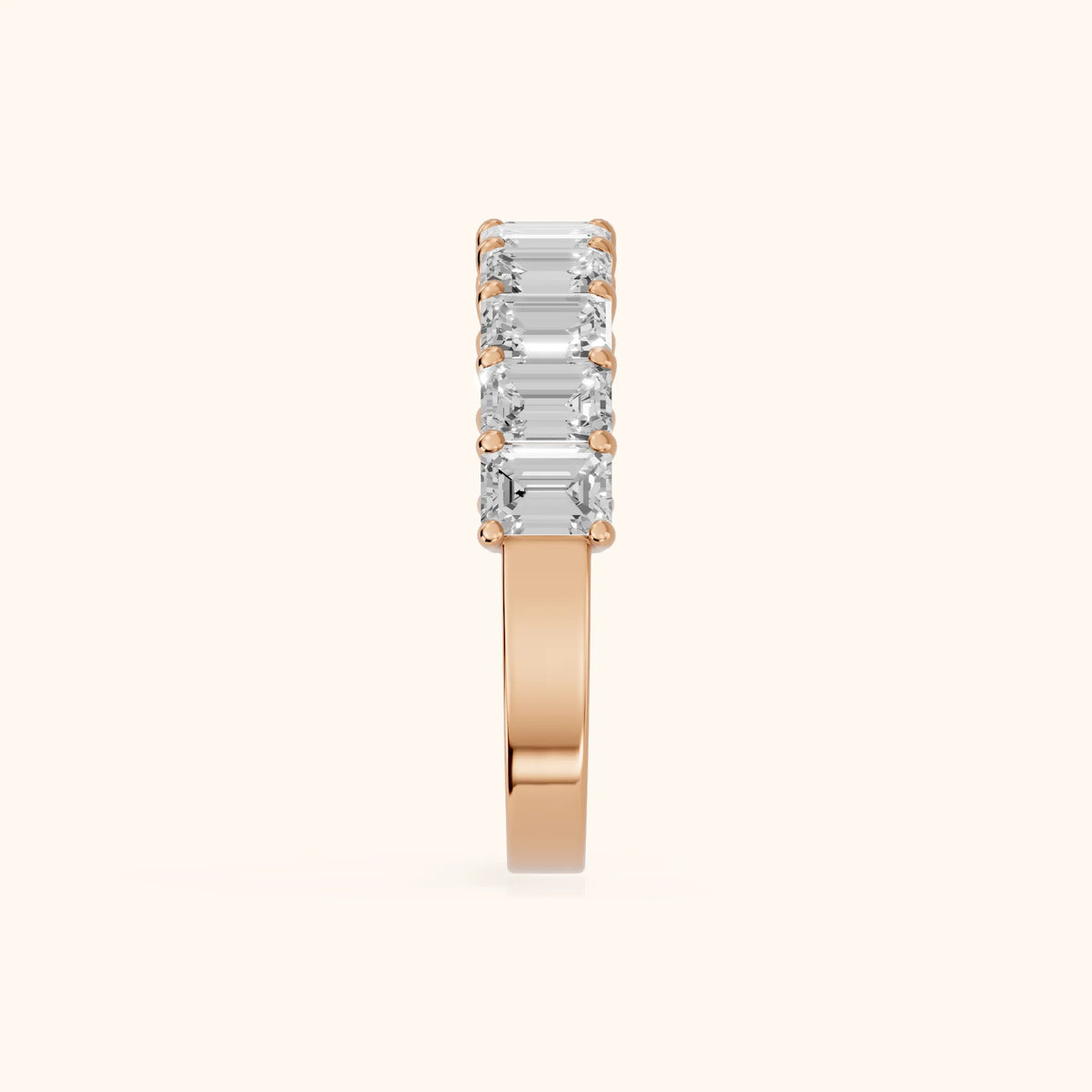 Nia Shared Prong Emerald Diamond Half Eternity Band in Rose Gold - SideView