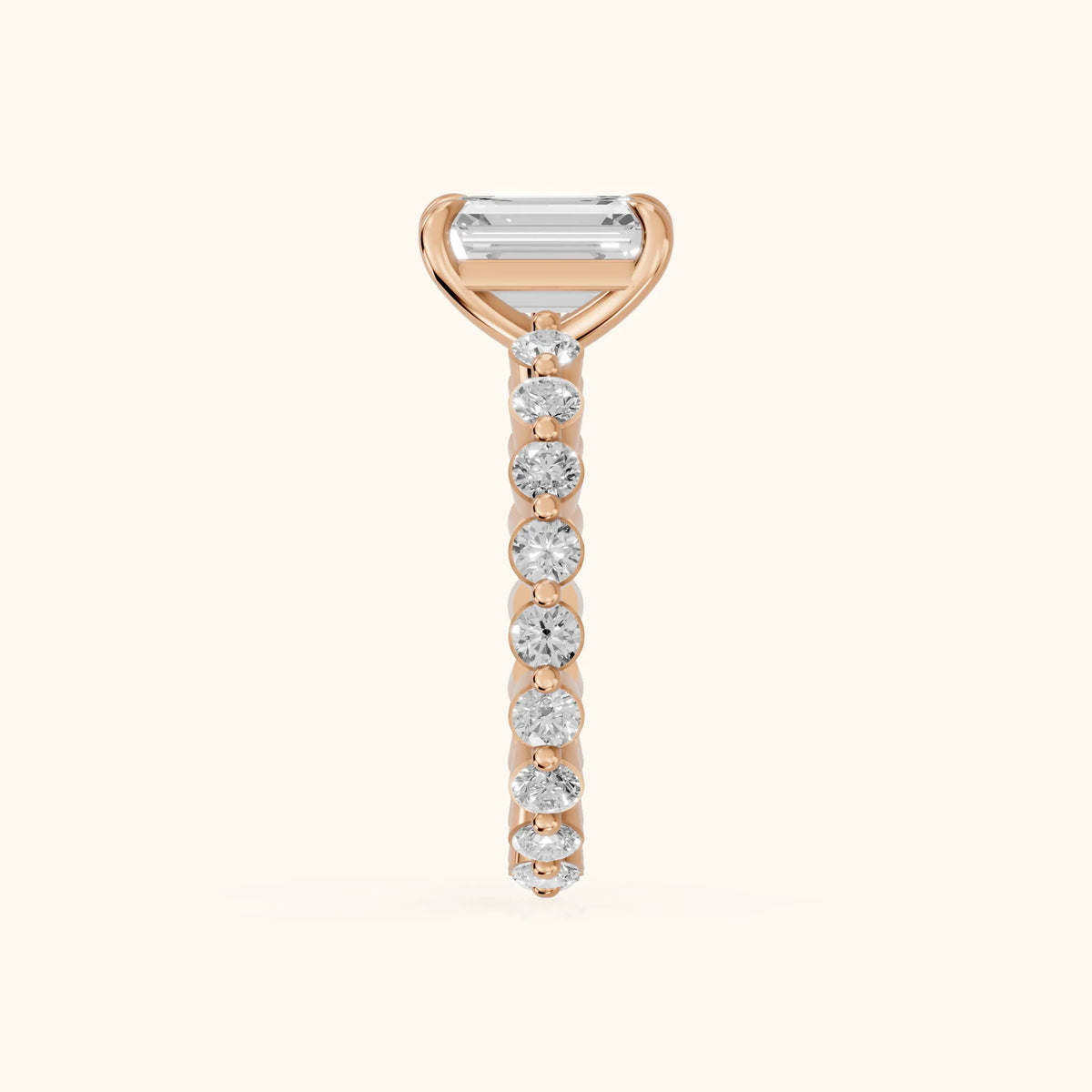 Piper Sidestone Emerald Diamond Engagement Ring in Rose Gold - SideView.webp