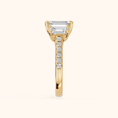 Gabrielle Three-Stone Pavé Emerald Diamond Engagement Ring in Yellow Gold - SideView.webp