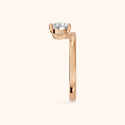 Maisie Four Prong Solitaire Oval Diamond Engagement Ring in Rose Gold - SideView.webp