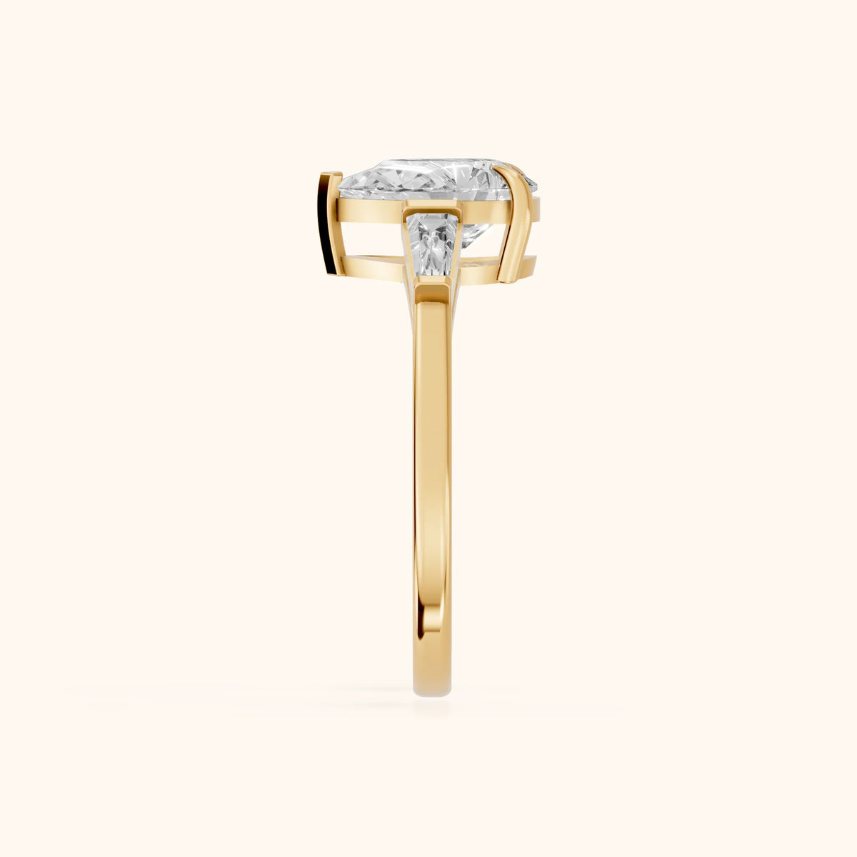 Winnie Three-Stone Pear Diamond Engagement Ring in Yellow Gold - SideView.webp