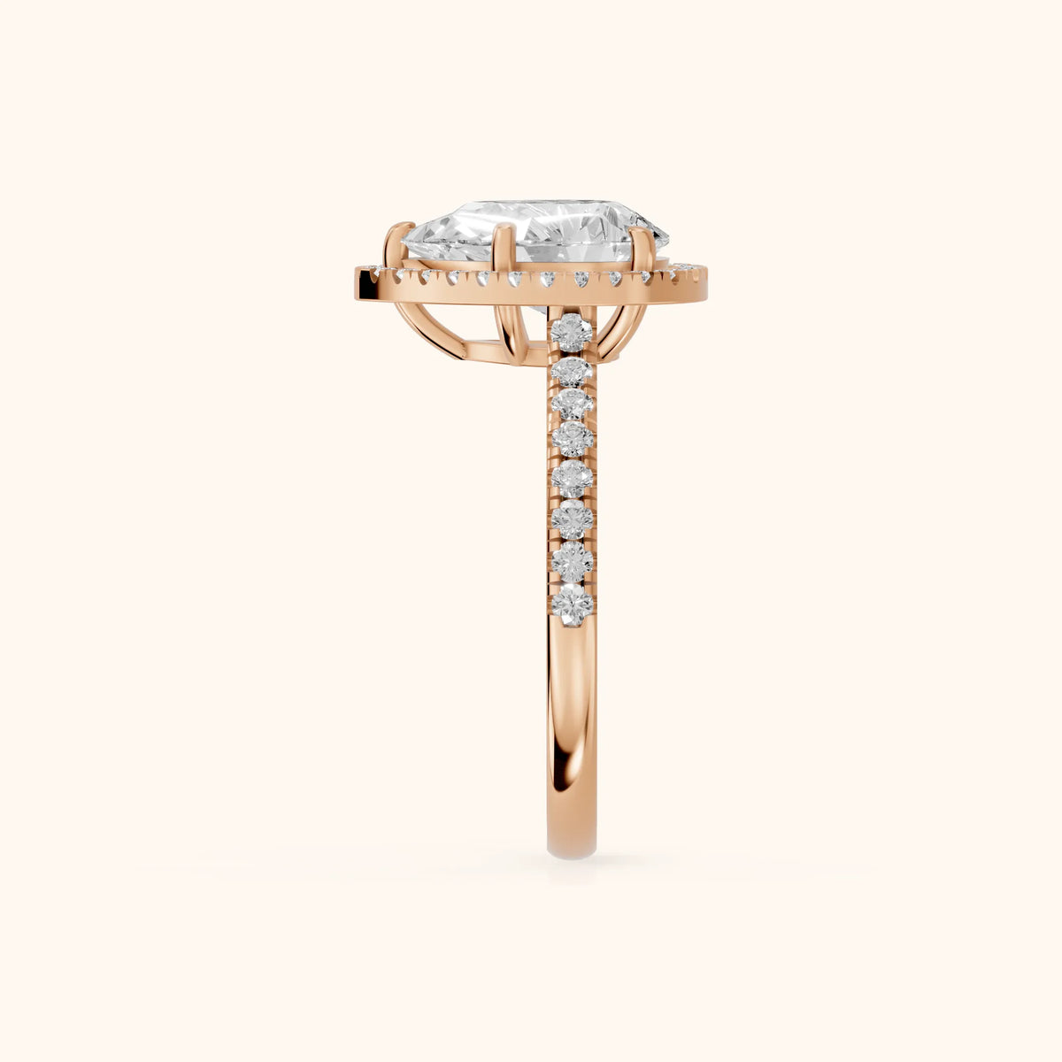 Mabel Halo French Pavé Pear Diamond Engagement Ring in Rose Gold - SideView.webp