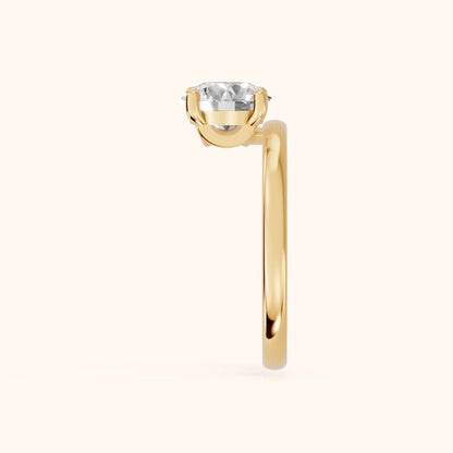 Maisie Four Prong Solitaire Round Diamond Engagement Ring in Yellow Gold - SideView.webp