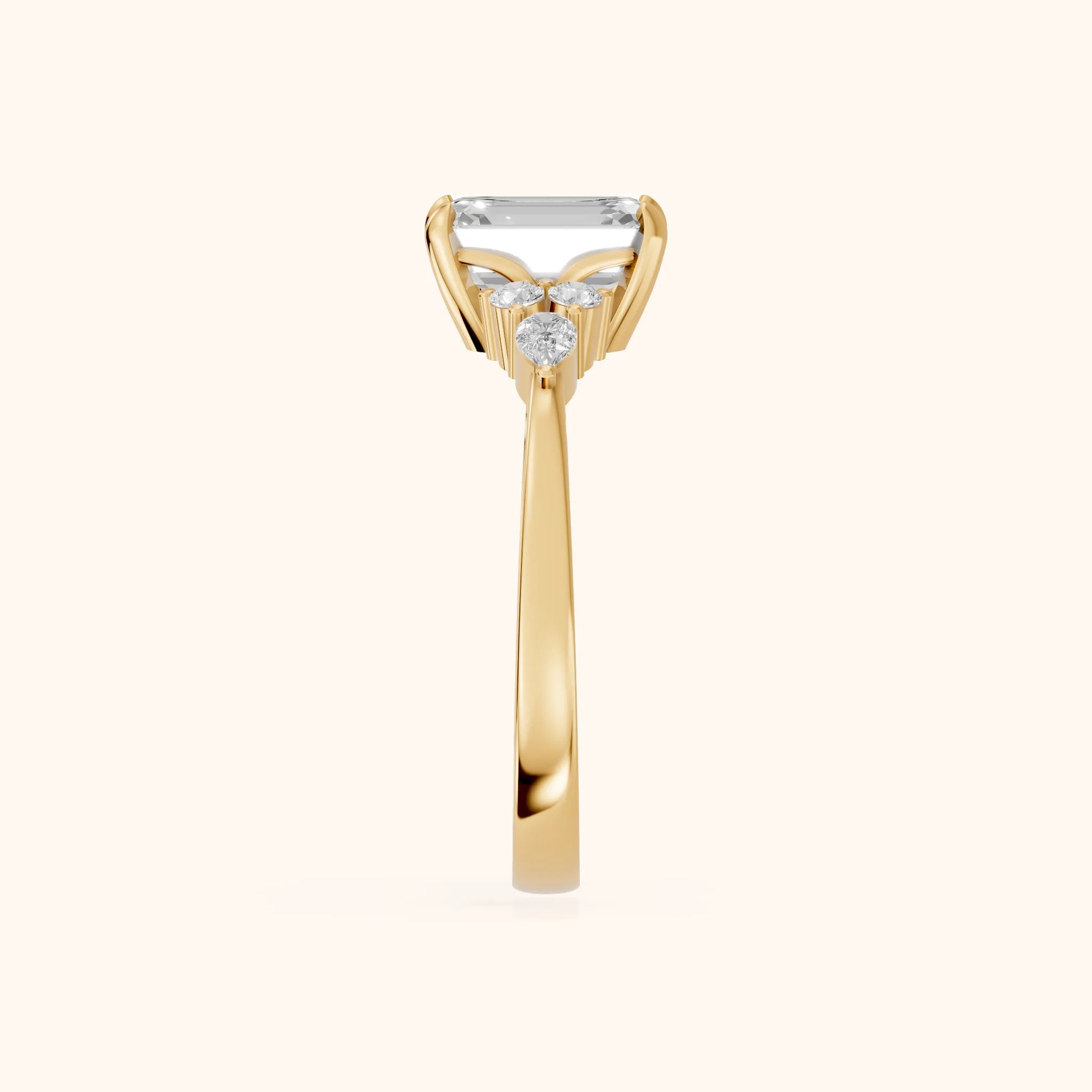 Amelia Three Stone Emerald Diamond Engagement Ring in Yellow Gold - SideView