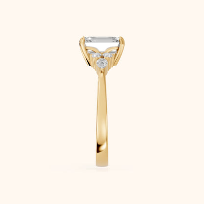 Amelia Three Stone Emerald Diamond Engagement Ring in Yellow Gold - SideView