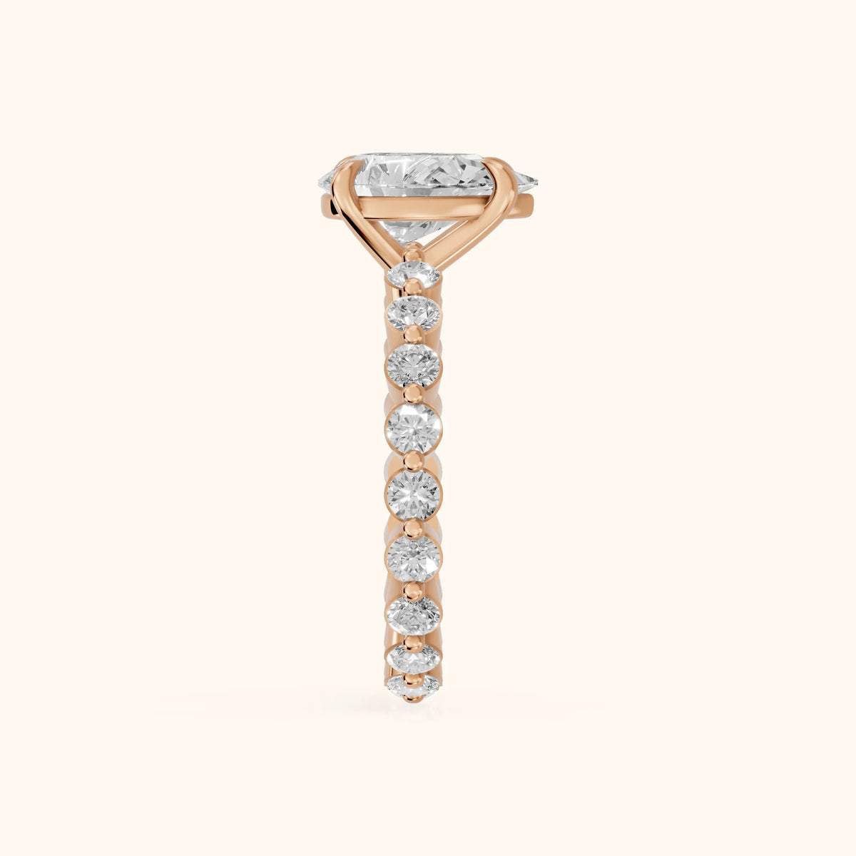 Piper Sidestone Pear Diamond Engagement Ring in Rose Gold - SideView.webp